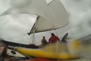 GoPro frame of the bamboo-polytarp crab full on a close reach from the leeward side.